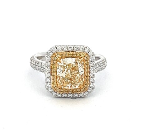 18Kt Two Toned Halo Style Ring With Cushion Yellow Diamond Weighing 2.02ct, And Yellow And White Round Diamonds Weighing 0.79ct
