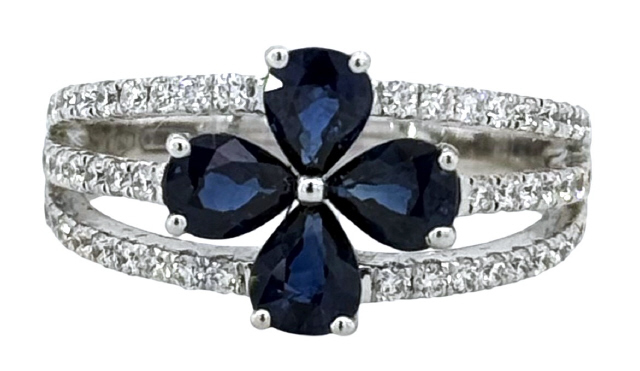 18Kt White Gold Three Row Flower Ring With (4) Pear Shaped Sapphires Weighing 1.46ct And (50) Round Diamonds Weighing 0.49ct