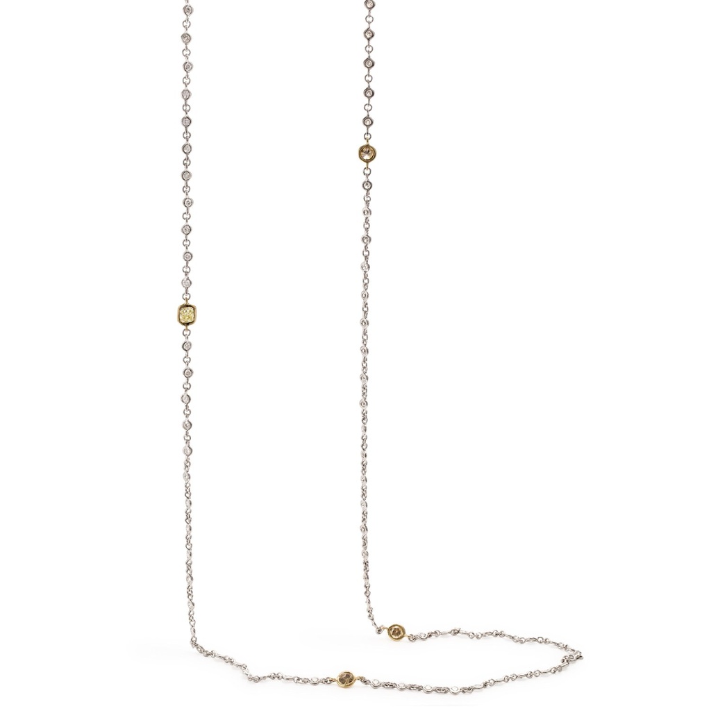 Platinum and 18Kt yellow gold diamonds by the inch necklace with diamonds weighing 6.07cttw