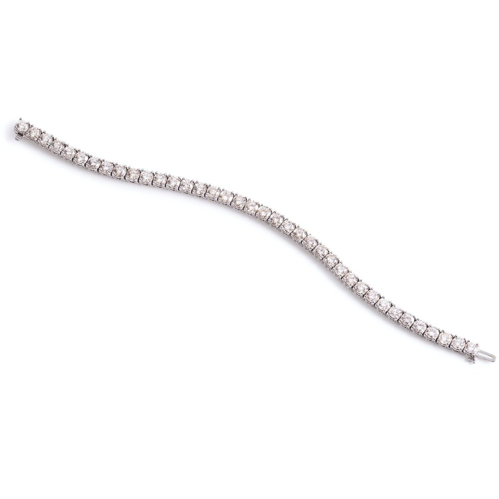 18Kt White Gold Tennis Bracelet With (38) Round Diamonds Weighing 12.52cttw