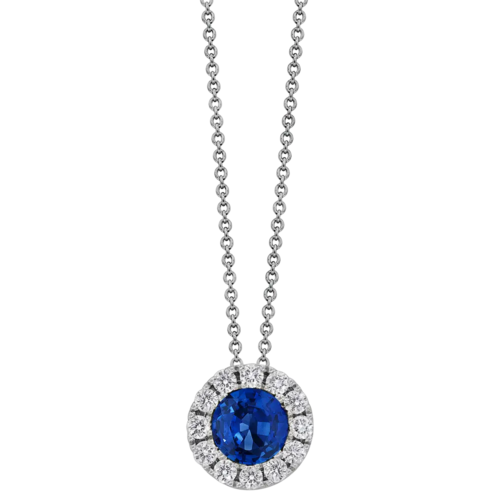 18Kt White Gold Circle Pendant Necklace With A Round Sapphire Weighing 0.30ct And (12) Round Diamonds Weighing 0.10ct