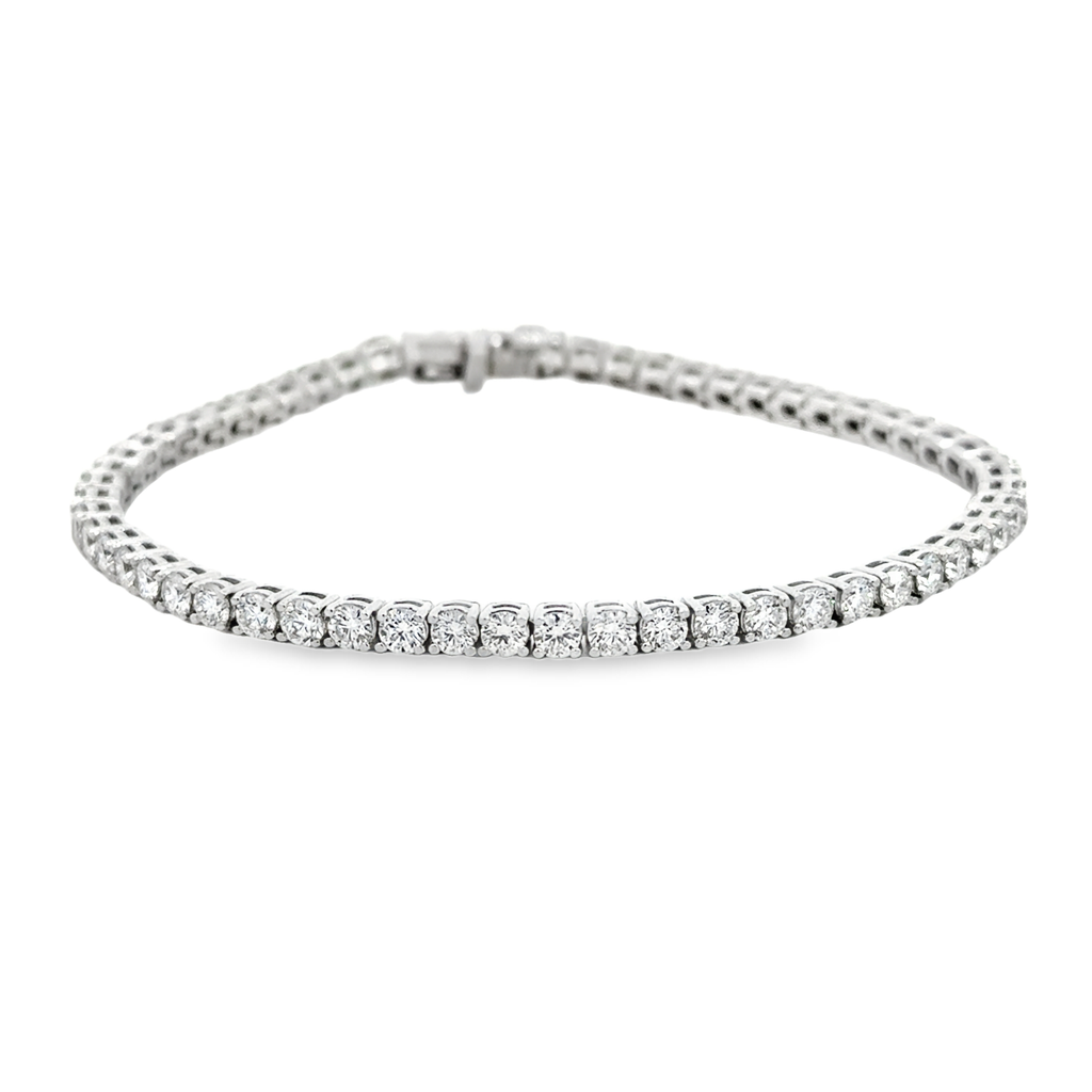 14Kt White Gold Tennis Bracelet With (59) Round Diamonds Weighing 5.09cttw