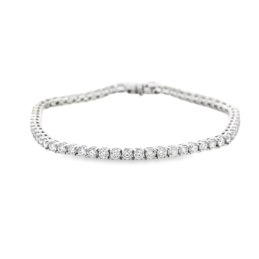 14Kt White Gold Tennis Bracelet With (63) Round Diamonds Weighing 4.03cttw