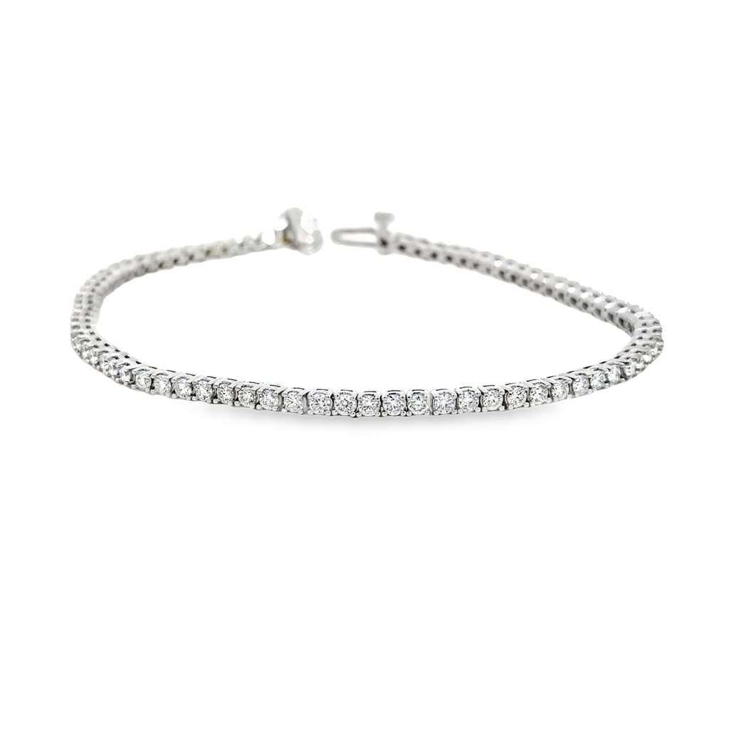14Kt White Gold Tennis Bracelet With (77) Round Diamonds Weighing 2.19cttw
