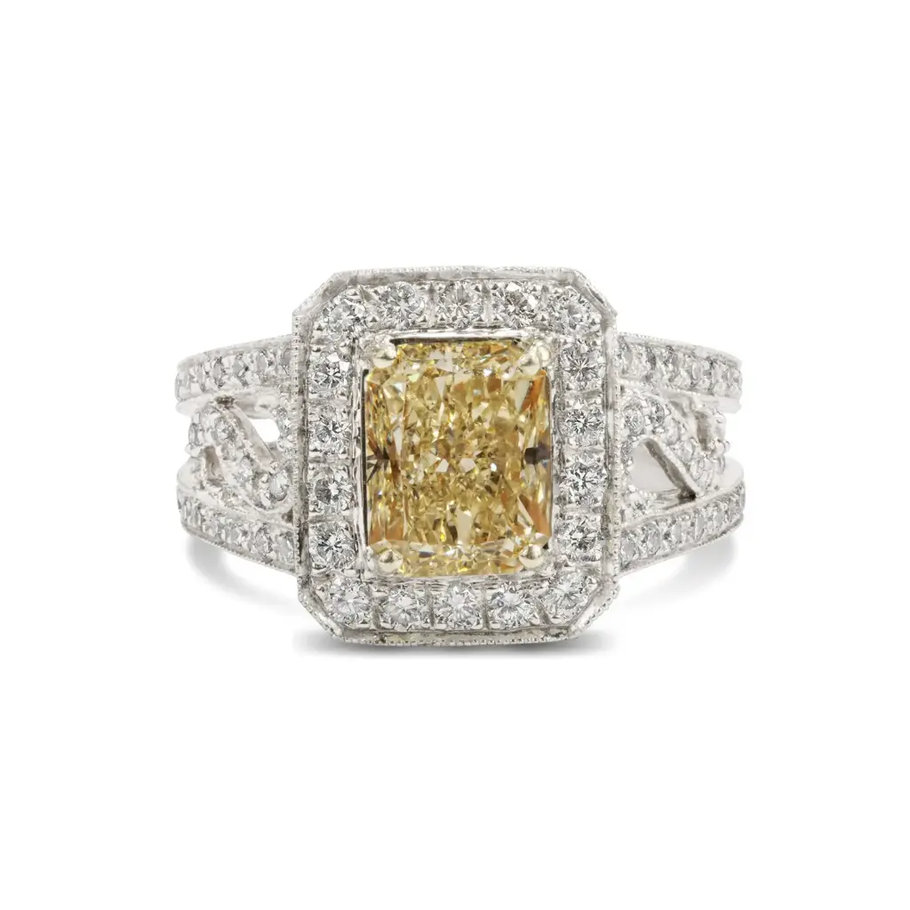 Halo Style Ring With A Radiant Cut Diamond Weighing 2.55ct YZ/VS1 And (134) Round Diamonds Weighing 1.09ct In Platinum And 18Kt Yellow Gold