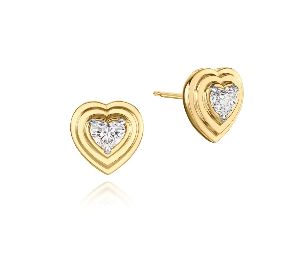 Storied Layered Heart Studs With (2) Heart Shaped Diamonds Weighing 0.60cttw In Platinum And 18Kt Yellow Gold