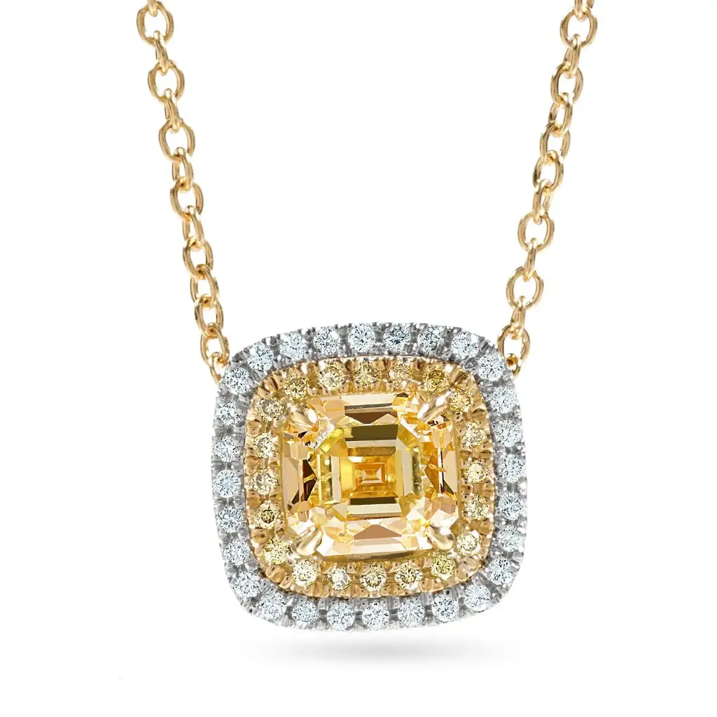 Double Halo Necklace With An Emerald Cut Diamond Weighing 2.06ct And (40) Round Diamonds Weighing 0.32cttw In 18Kt White And Yellow Gold