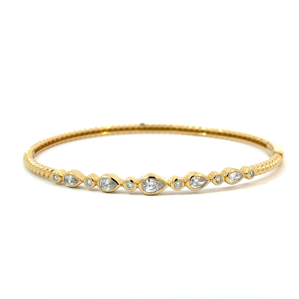 Bangle Bracelet With (6) Round Diamonds And (5) Pear Shaped Diamonds Weighing 0.87cttw In 18Kt Yellow Gold