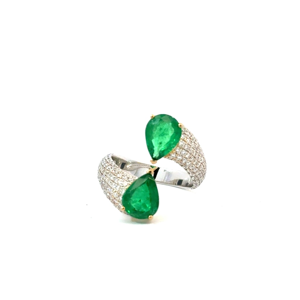 Bypass Ring With (2) Pear Shaped Emeralds Weighing 2.70ct And Round Diamonds Weighing 1.05ct In 18Kt White Gold