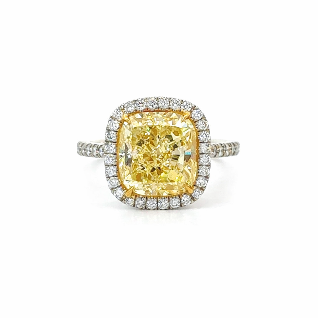 [RCMB493] Platinum and 18Kt Yellow Gold Halo Ring With A Cushion Cut Yellow Diamond Weighing 4.93ct and Round Diamonds Weighing 0.30ct