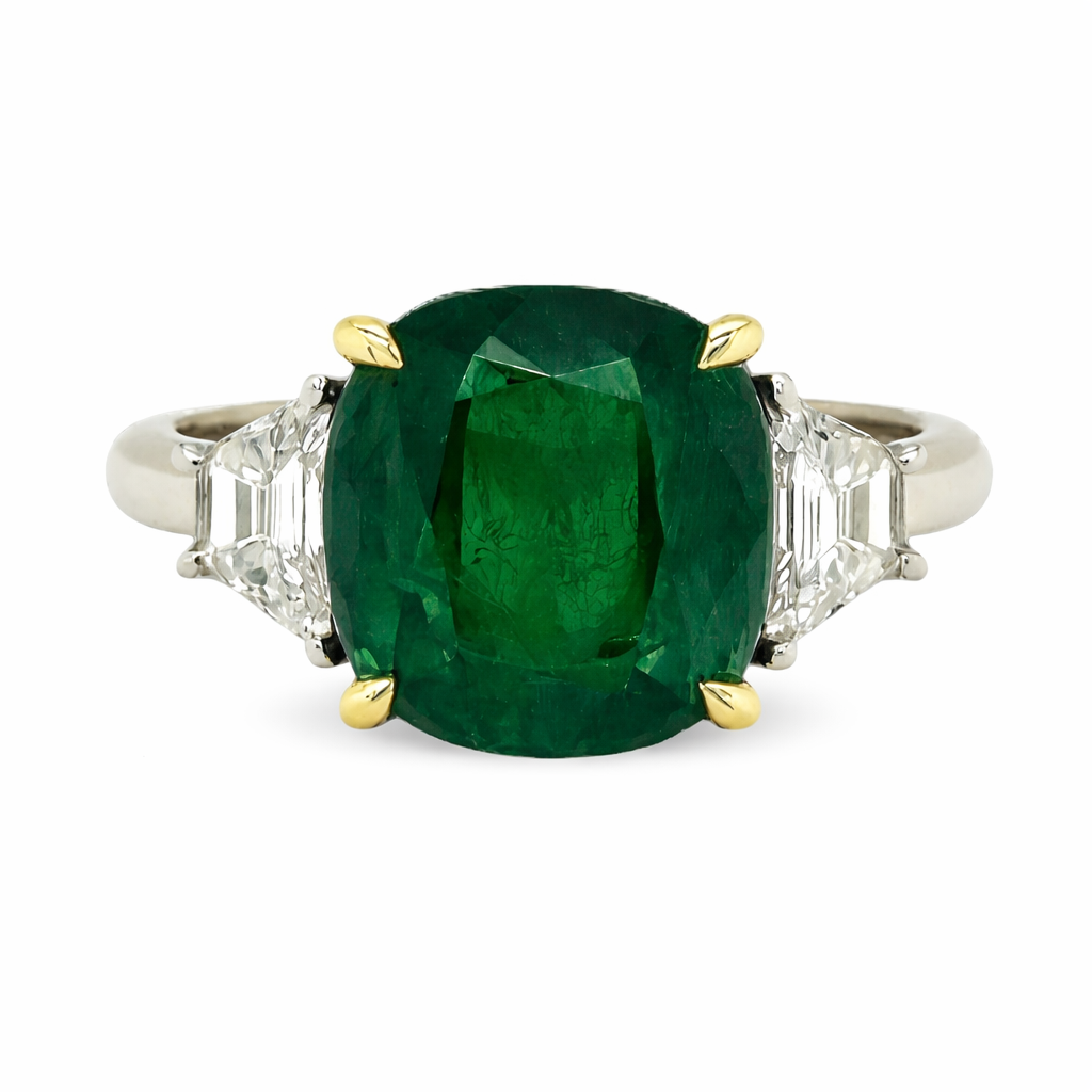 [24186] Platinum And 18Kt Yellow Gold Three Stone Ring With A Cushion Cut Emerald Weighing 5.17ct And (2) Trapezoid Diamonds Weighing 0.55ct