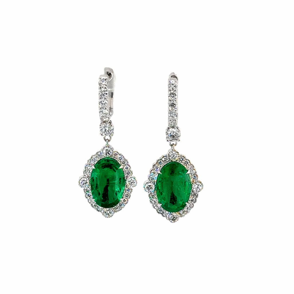 [24574] 18Kt White Gold Halo Dangle Earrings With (2) Oval Emeralds Weighing 5.46ct And (60) Round Diamonds Weighing 1.47ct