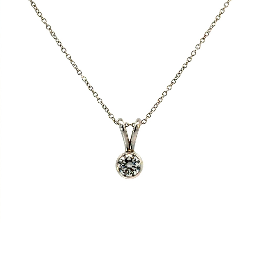 [S15622] 14Kt White Gold Solitaire Bezel Necklace With (1) Round Diamond Weighing 0.70ct