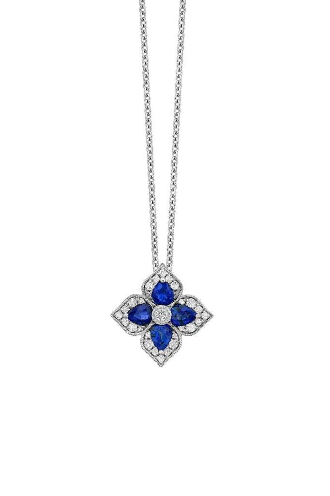 18Kt White Gold Flower Pendant With (4) Pear Shaped Sapphires Weighing 0.80ct And (29) Round Diamonds Weighing 0.18ct