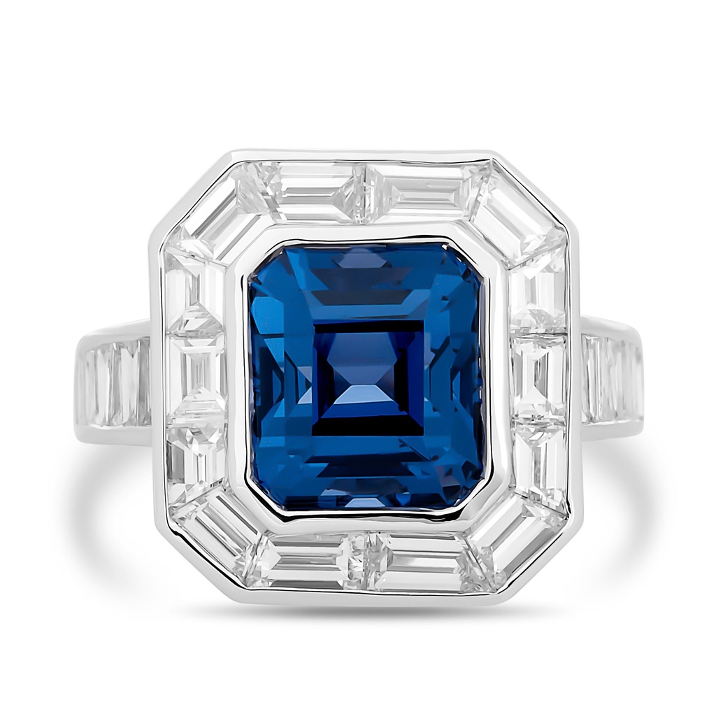 18Kt White Gold Ring With An Emerald Cut Spinel Weighing 5.30ct And (30) Emerald Cut And Baguette Diamonds Weighing 2.70ct