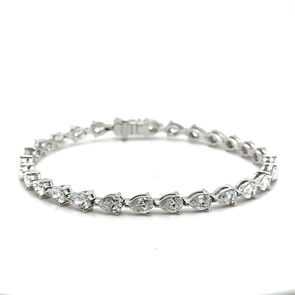 18Kt White Gold Tennis Bracelet With (28) Pear Shaped Diamonds Weighing 6.88cttw