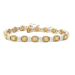 [7533-3] 18Kt Two Toned Bracelet With (18) Cushion Cut Yellow Diamonds Weighing 2.86ct, (216) Round Yellow Diamonds Weighing 1.67ct, And (72) Round White Diamonds Weighing 1.53ct