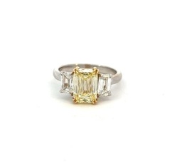 [6970] 18Kt Two Toned Ring With (1) Yellow Ashoka Cut Diamond Weighing 2.27ct And (2) White Ashoka Cut Diamonds Weighing 1.16ct
