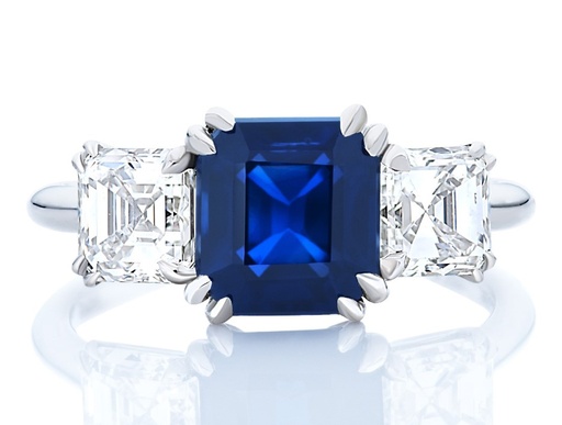 [R79102.3] Platinum Three Stone Ring With A Square Emerald Cut Sapphire Weighing 2.32ct And (2) Square Emerald Cut Diamonds Weighing 1.49ct