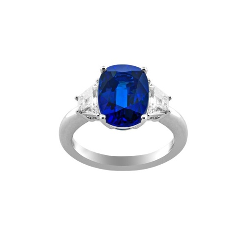 [29370/S] Platinum Three Stone Ring With A Cushion Cut Sapphire Weighing 3.61ct And (2) Trapezoid Diamonds Weighing 0.64ct