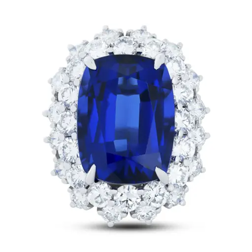 [R77305.1] Halo Style Ring With An Elongated Cushion Cut Tanzanite Weighing 19.90ct And (32) Round Diamonds Weighing 4.93ct In Platinum