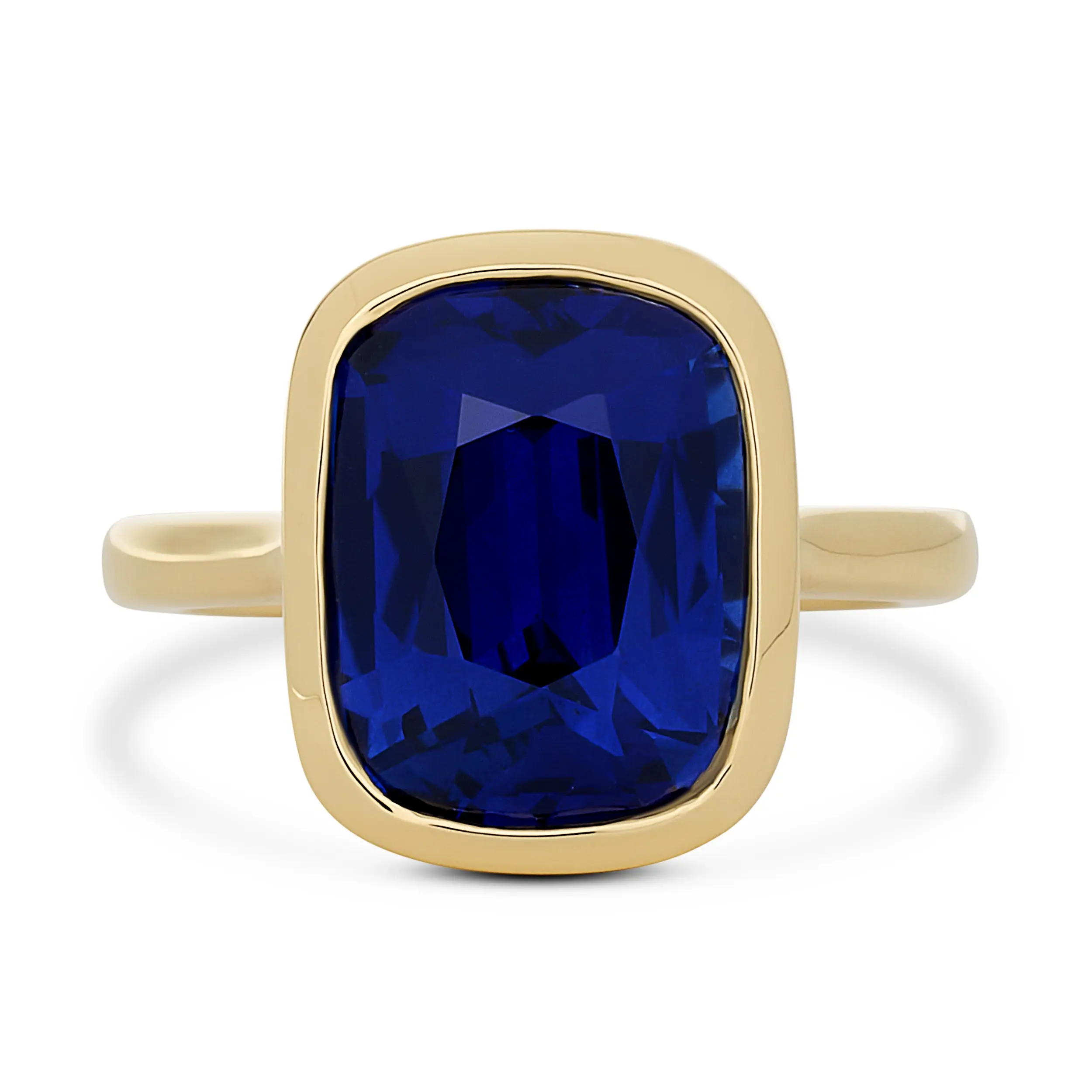 Bezel Set Ring With A Cushion Cut Sapphire Weighing 9.27cttw