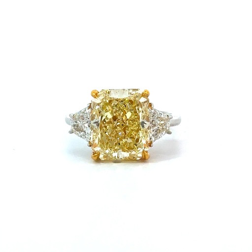[RRA620] Platinum and 18Kt Yellow Gold Ring With A Radiant Cut Diamond Weighing 6.20ct and (2) Trapezoid Diamonds Weighing 0.85ct